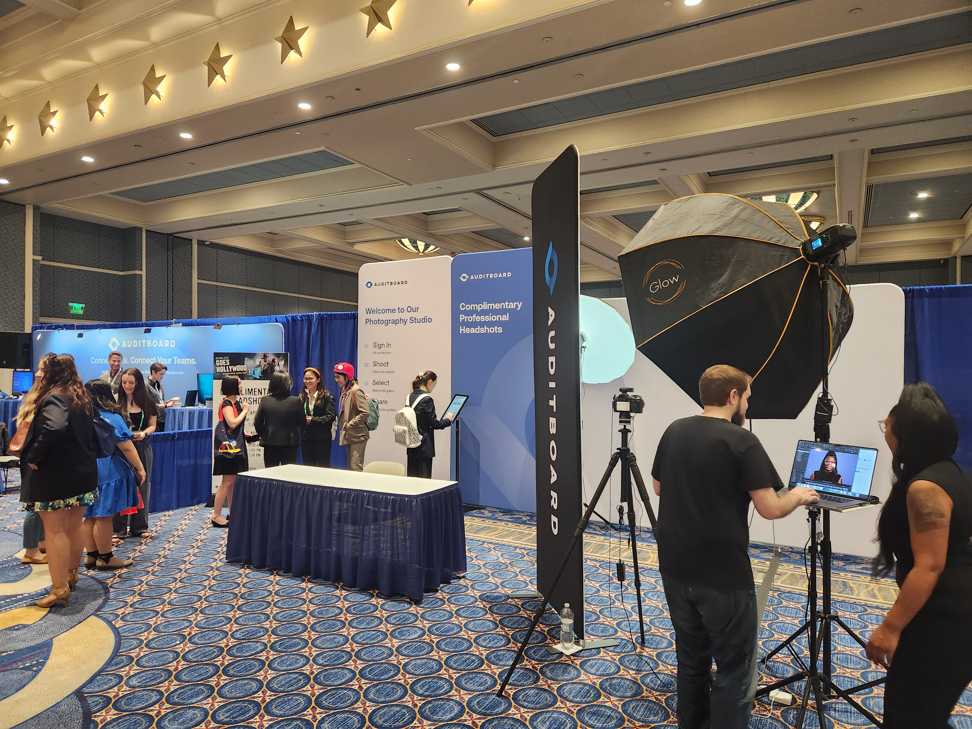 Trade show headshot photographer booth AuditBoard convention portrait photography national