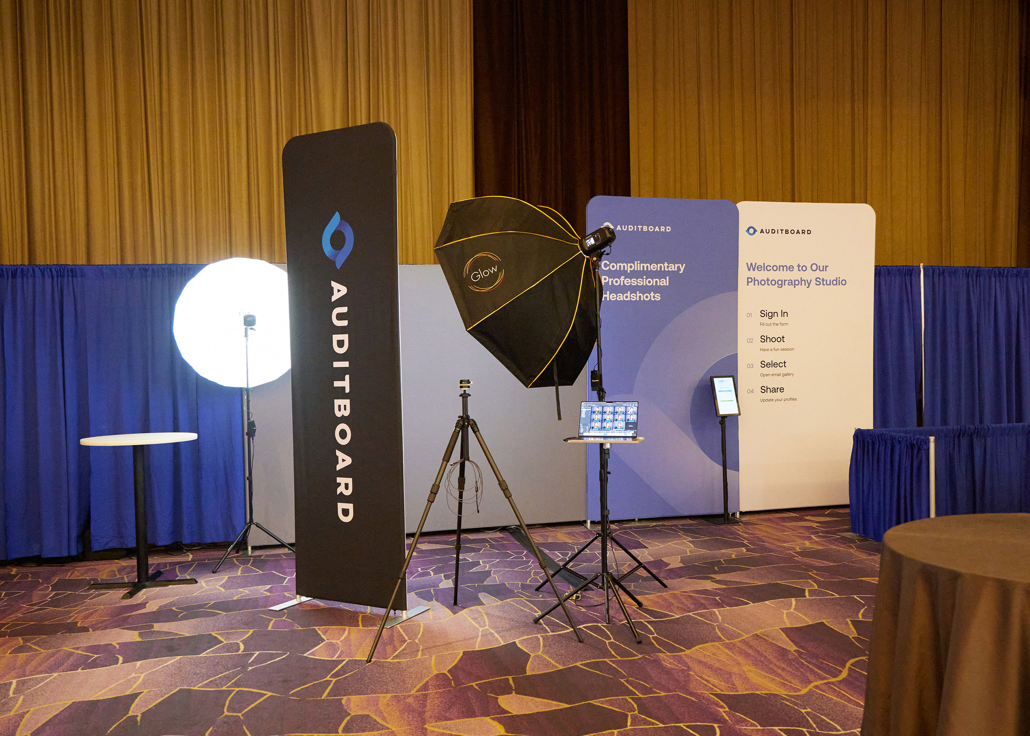 Conference headshot booth branded signage backdrop professional trade show photography nationwide